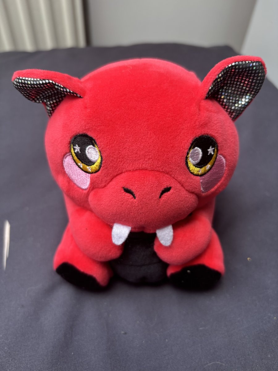 Illustration de Peluche dragon 