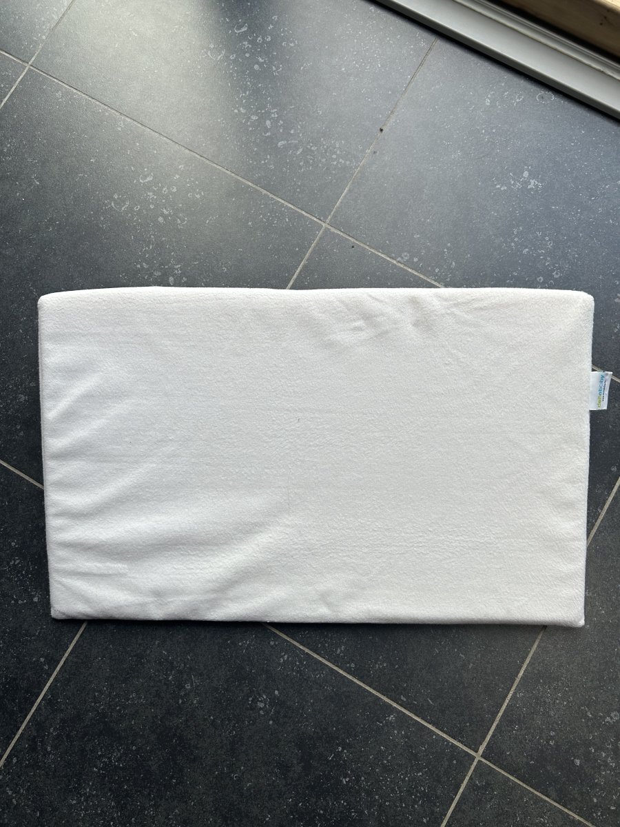 Illustration de Coussin anti-reflux 