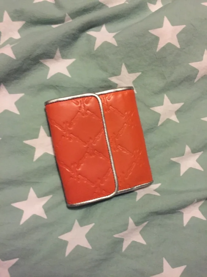 Illustration de Porte-feuille Longchamp orange  
